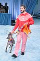dylan obrien walks runway with a dog 05
