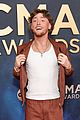 bailey zimmerman flashes his new teeth at cma awards 2025 03