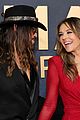billy ray cyrus elizabeth hurley hold hands at cma awards 2025 03