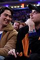 sean kaufman plants kiss on christopher briney at new york knicks game 05