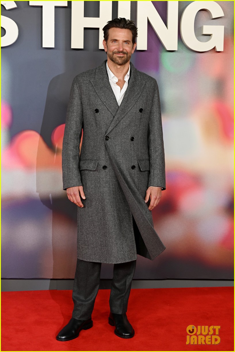 bradley cooper shares group hug with is this thing on cast at uk premiere 035268574