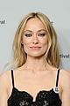 olivia wilde wears ice out pin to the invite premiere receives standing ovation 15