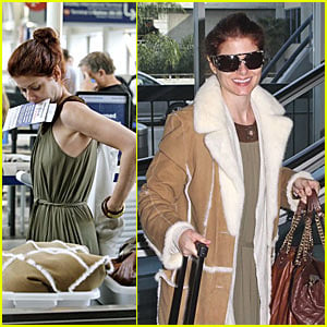 Debra Messing Gets Checked Out