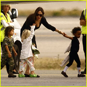 Brad and Angelina Jet Off With Twins