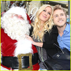Spencer & Heidi Get Santa Smooches