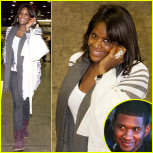 Usher's Wife is Still Smiling