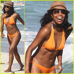 Gabrielle Union spends the day at the beach with her family wearing an  orange bikini Miami, Florida - 22.12.11 Stock Photo - Alamy