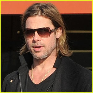 Brad Pitt Walks With A Cane