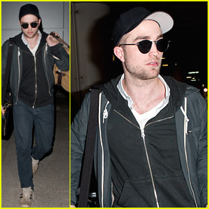 Robert Pattinson Gets Escorted Out of LAX