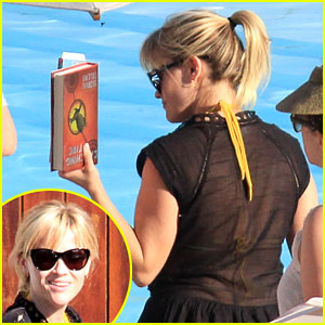 Reese Witherspoon Reads 'Catching Fire' in Rio!