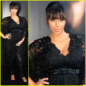 Kim Kardashian Holds Baby Bump at 'Temptation' Premiere