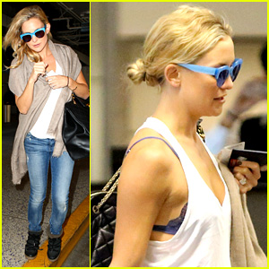 Kate Hudson Flashes Bra at the Airport