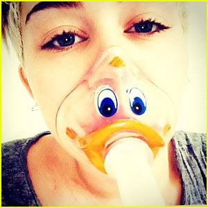 Miley Cyrus Can Still Joke Around with Duck-Face Oxygen Mask!