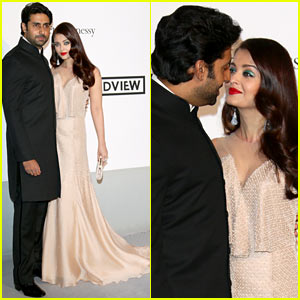 Aishwarya Rai & Husband Abishek Bachchan Share Sweet Glance at Cannes amfAR Gala 2014