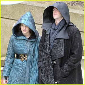 Jennifer Lawrence & Liam Hemsworth Hide Under Their Robes on Paris 'Mockingjay' Set