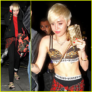 Miley Cyrus Enters a Club Fully Clothed, Leaves in Her Bra!