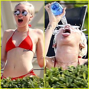 Miley Cyrus Displays Her Amazing Bikini Body, Douses Herself with Water While Hanging Poolside