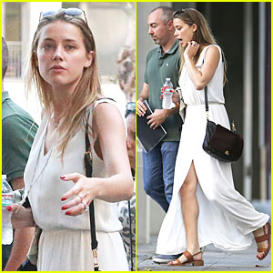 Amber Heard Brings All the Attention to Her Legs in High Slitted Dress