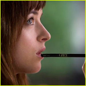 Dakota Johnson's Anastasia Steele Gives A Suggestive Look in New 'Fifty Shades of Grey' Still