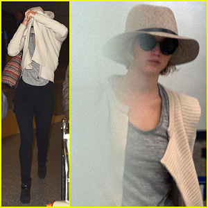 Jennifer Lawrence Touches Down at LAX After Hitting Up London for 'Serena' Premiere!