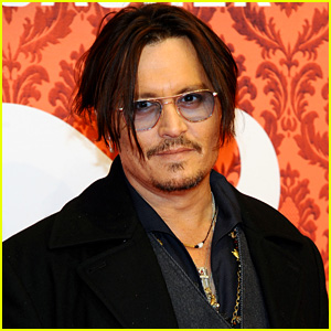 Johnny Depp Dons Trenchcoat to 'Mordecai' Berlin Premiere