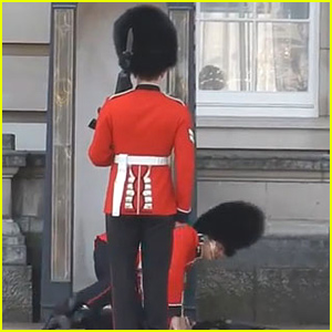 Buckingham Palace Guard Falls In Front of Tons of Tourists (Video)
