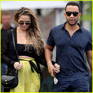 Chrissy Teigen & John Legend Hold Hands Before Their Baby’s Gender