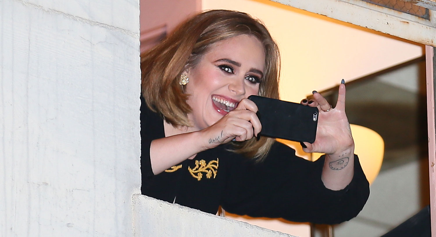 Adele Pops Out of Her Wiltern Window: 'I Feel Like Justin Bieber ...