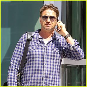 Gerard Butler Takes Call on His Way to Business Meeting