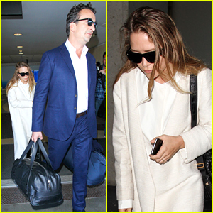 Mary-Kate Olsen Lands at LAX with Husband Olivier Sarkozy