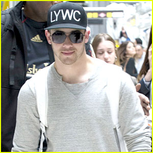Nick Jonas Jets Out of Madrid After 'Chainsaw' Vid Drops