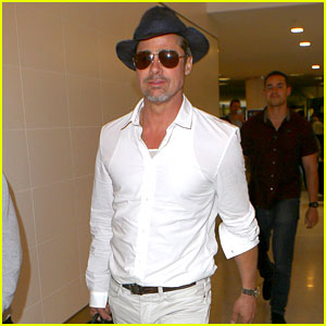 Brad Pitt Wears All White for His LAX Arrival