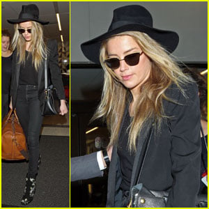 Amber Heard Emerges at LAX After Divorce Settlement