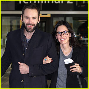 Courteney Cox is Joined by Johnny McDaid at Heathrow Airport