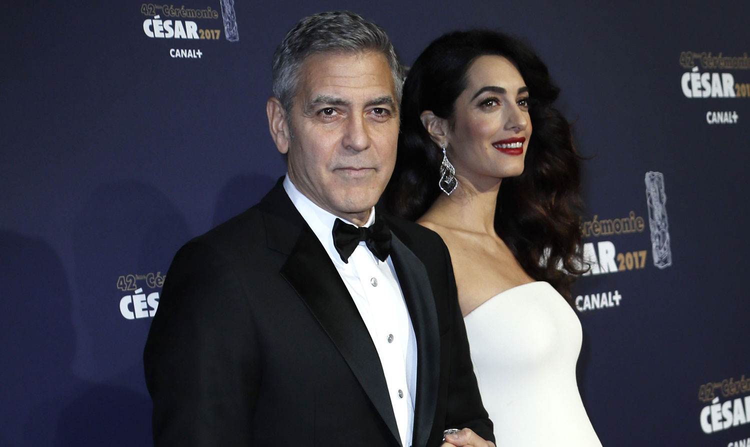 Pregnant Amal Clooney Debuts Baby Bump with Husband at Cesar