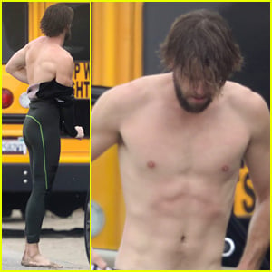 Liam Hemsworth Strips Out of Wetsuit to Reveal Ripped Abs
