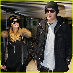 Paris Hilton & Chris Zylka Fly Out of London with Lots of Luggage