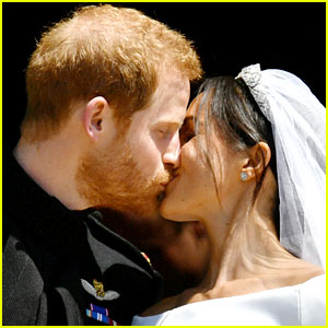 Prince Harry & Meghan Markle Share First Kiss as Newlyweds!