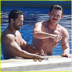 Luke Evans Shows Off His Shirtless Body In the Pool with Victor Turpin