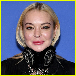 Lindsay Lohan Gets Punched in Face After Trying to Take Kids She