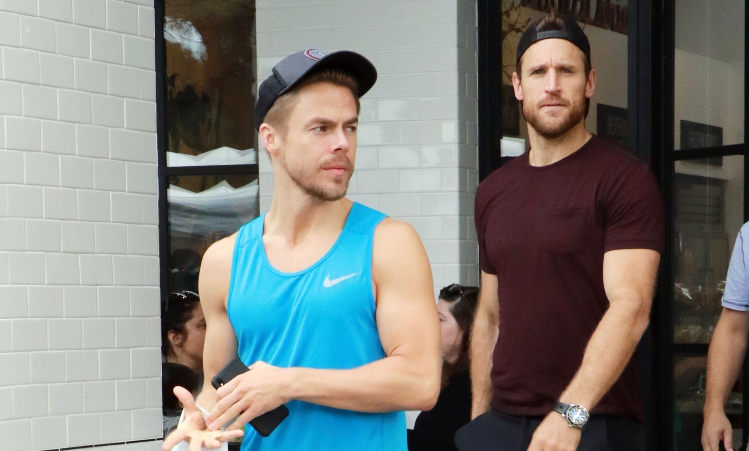 Derek Hough Muscles Up at Farmer’s Market with BrotherinLaw Brooks