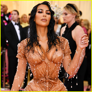 Kim Kardashian Shows Off Her Curves in Form-Fitting Mini Dress