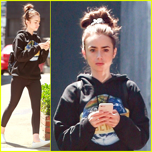 Lily Collins Spots Her Lancome Ad In Paris!