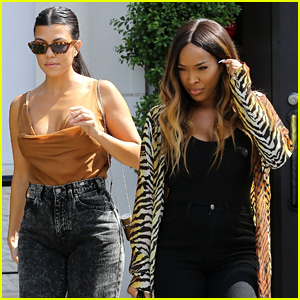Kourtney Kardashian Pairs Plunging Top With Acid Wash Jeans for Lunch in LA