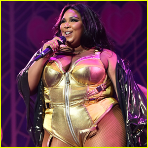 Lizzo Shines in Gold Bodysuit on Stage at NYC Concert!