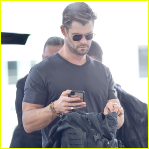 Chris Hemsworth Shows Some Muscle While Leaving Brisbane