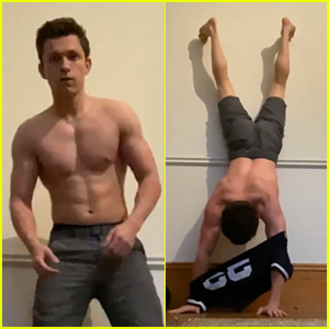 Tom Holland Attempts The 'Impossible Challenge' Of Putting a Shirt On While Doing a Handstand