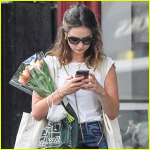 Lily James Buys A Bouquet of Tulips While Out in London