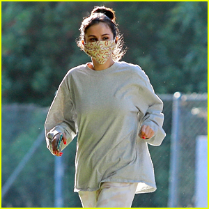 Selena Gomez Goes For a Masked Stroll With a Friend