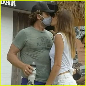 Gerard Butler Kisses Girlfriend Morgan Brown Through His Mask!